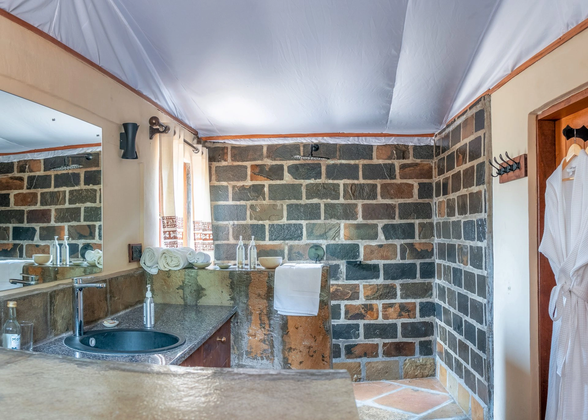 Family Safari Tent bathroom with vanity and walk-in shower